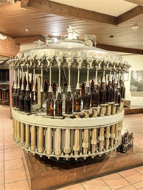 Máquina embotelladora antigua de Coca-Cola