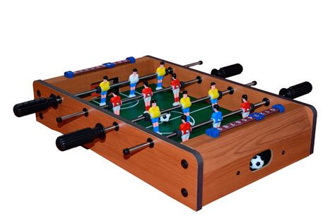mesa de futbolito y balón en juego