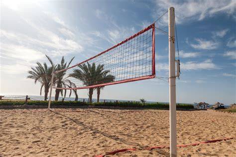 Poleras mixtas de vóley playa en cancha