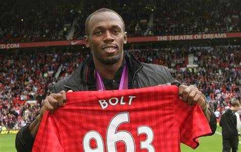 Usain Bolt en Old Trafford con camiseta del Manchester United