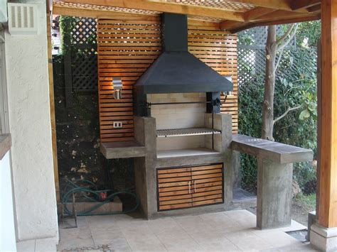 Terraza quincho deportivo con parrilla