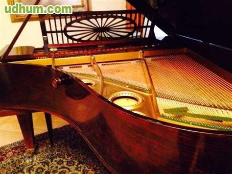 piano de cola antiguo restaurado