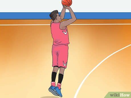 Base de baloncesto lanzando un triple