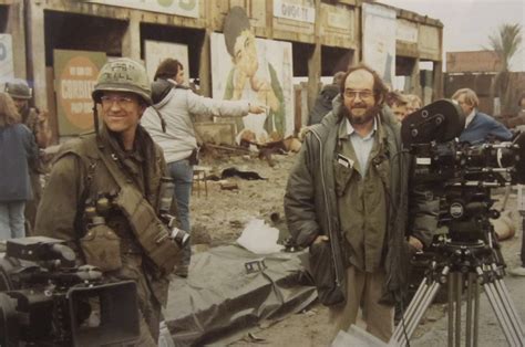 Stanley Kubrick fotografiando un combate