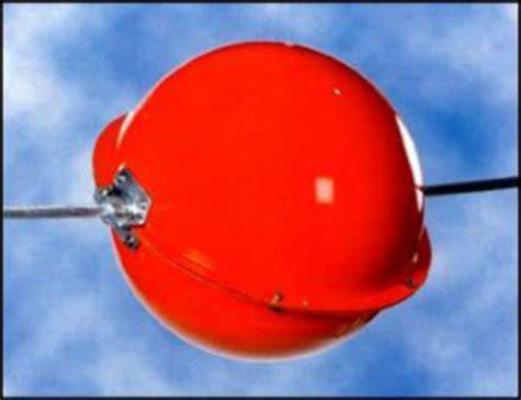 Esfera naranja de balizamiento en cable eléctrico