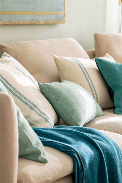 combinación de cojines en sillón