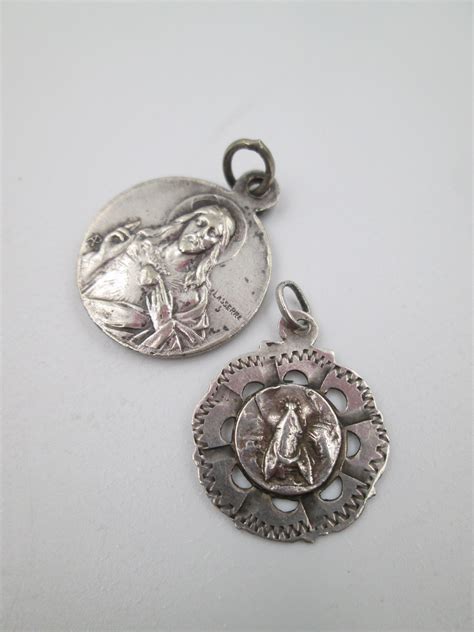 Medallas religiosas de Virgen y Ángel