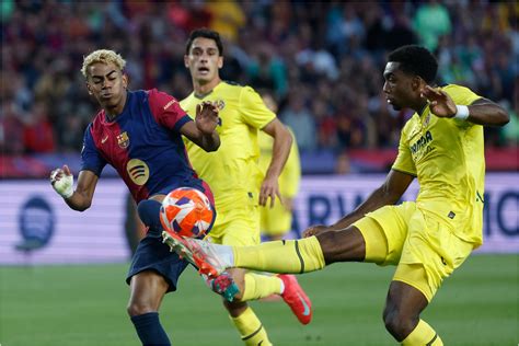 Jugadores del Barcelona y Villarreal