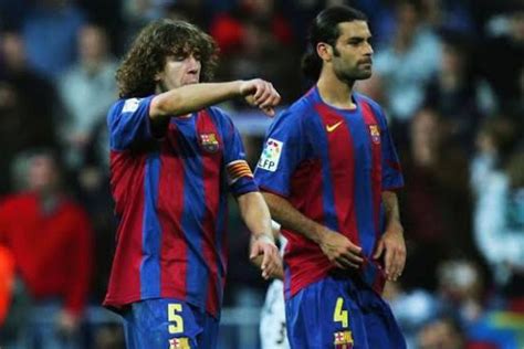 Carles Puyol y José Mourinho en un Clásico