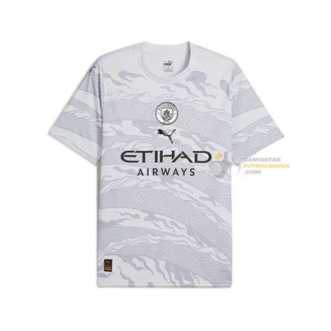 camiseta blanca Manchester City banda diagonal