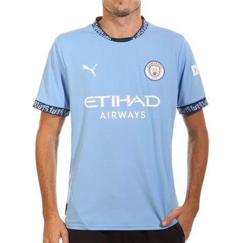 camiseta celeste Manchester City Northern Quarter