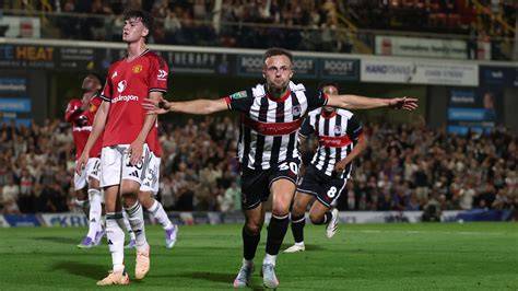 Grimsby Town celebra eliminar al Manchester United