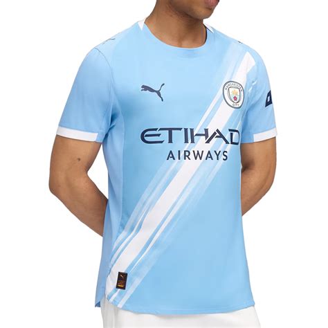 Manchester City camiseta azul cielo estadio