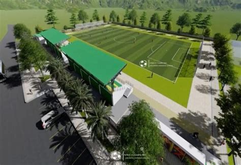 Estadio comunitario con graderías y áreas verdes