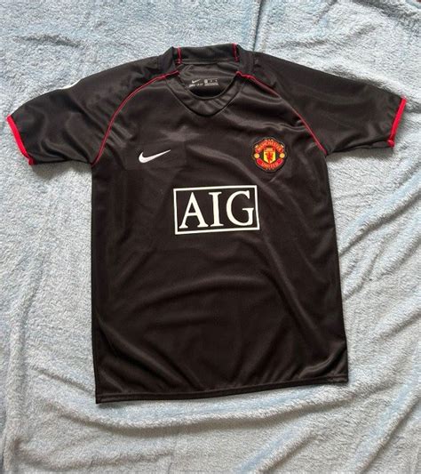 Manchester United 1999 camiseta retro negra